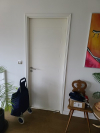 image_Pose d'une chatière sur porte intérieur simple
